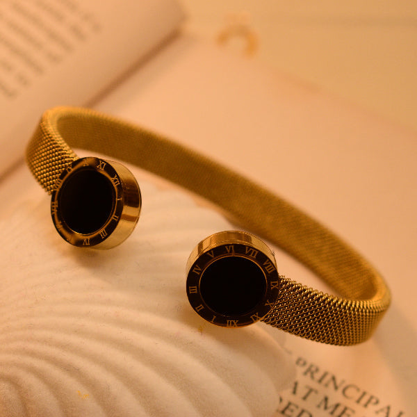 Elegant Gold Mesh Bangle with Black Onyx Accents